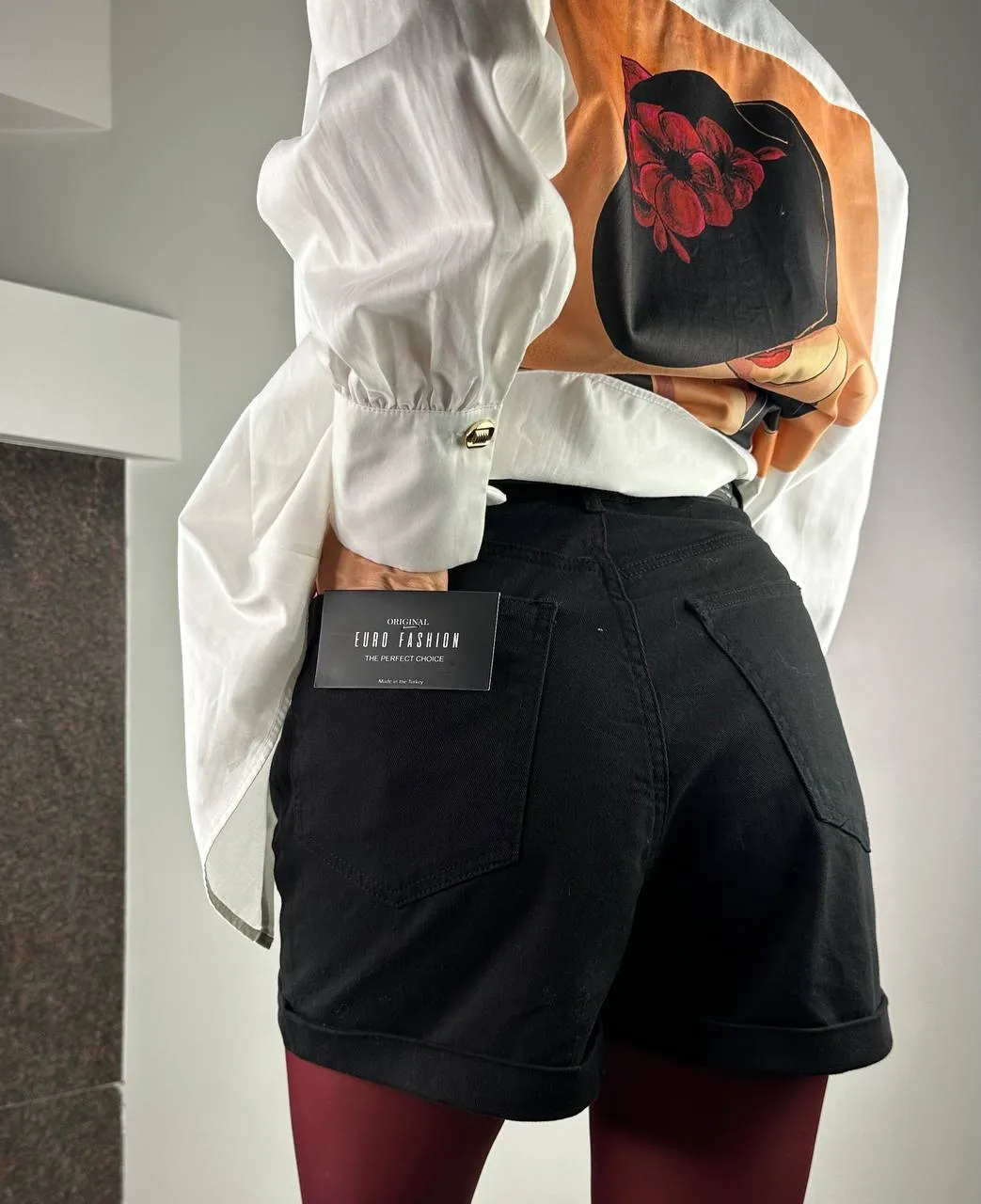 Black denim shorts