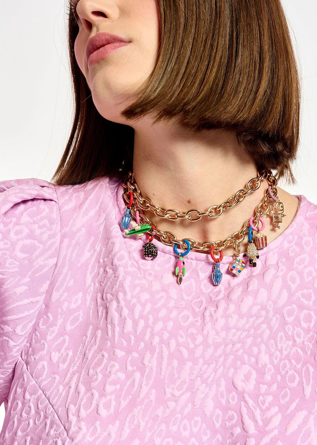 Light pink jacquard top with puffed sleeves