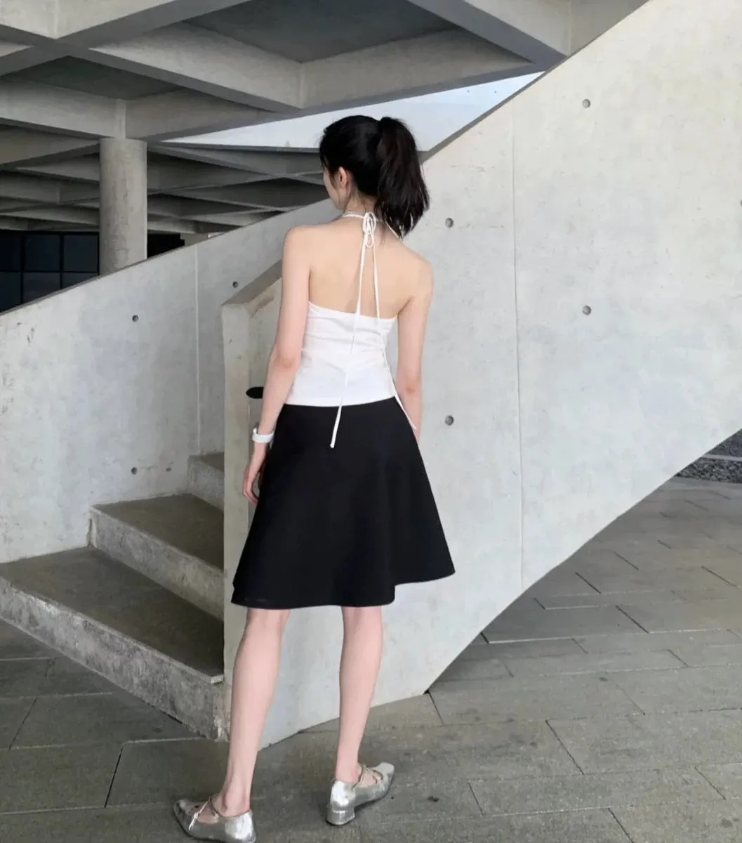 Pleated puffy black A-line skirt