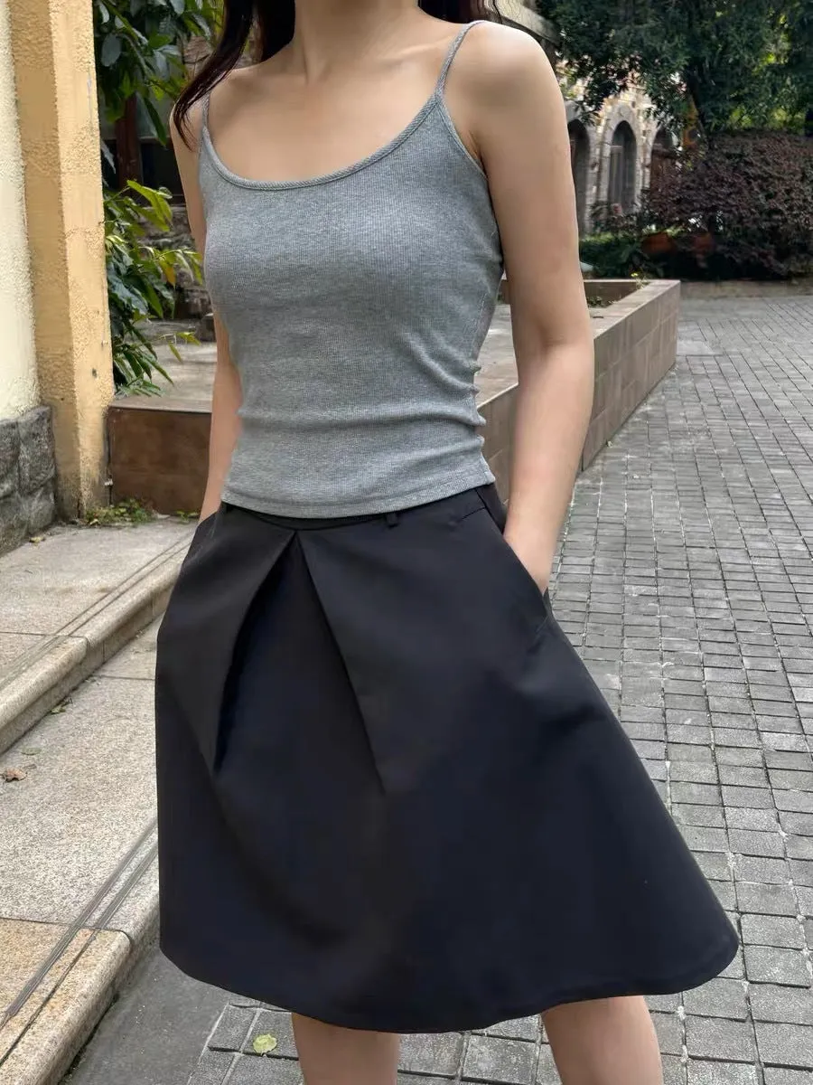 Pleated puffy black A-line skirt