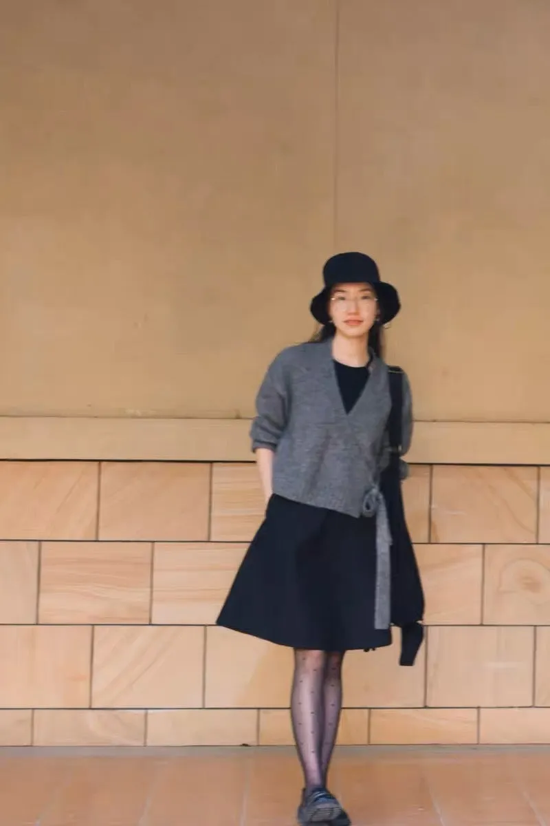 Pleated puffy black A-line skirt