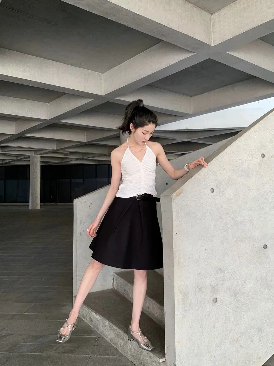 Pleated puffy black A-line skirt