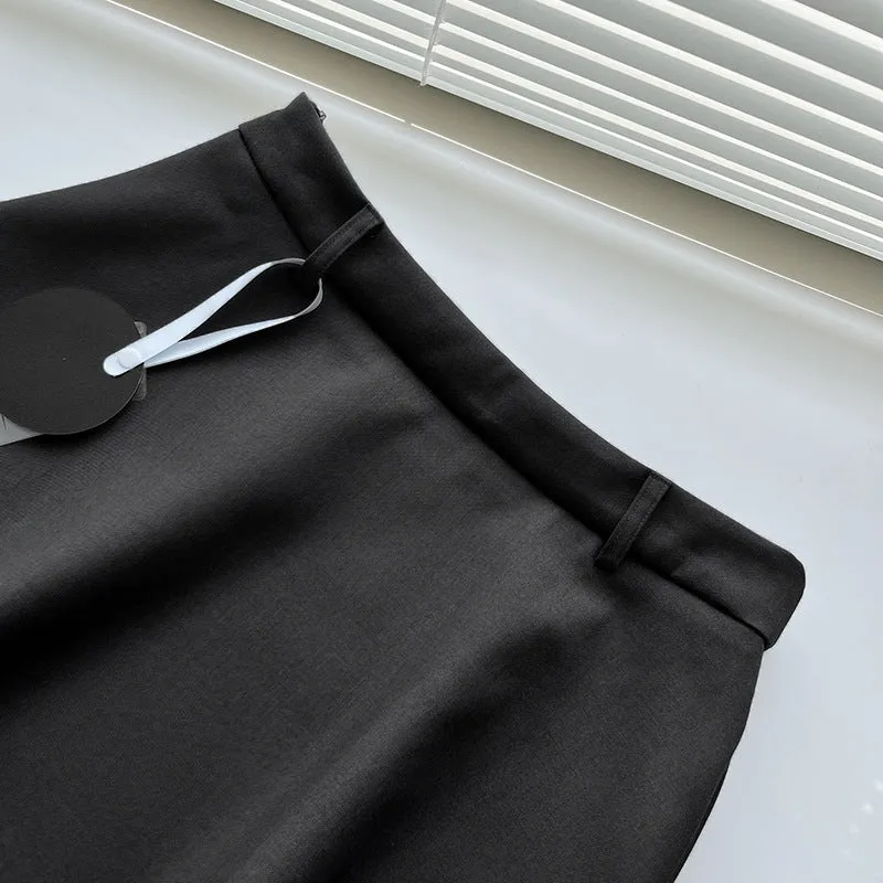 Pleated puffy black A-line skirt