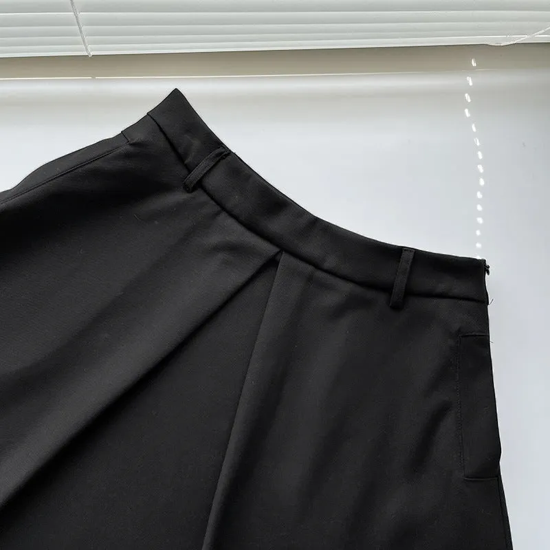 Pleated puffy black A-line skirt