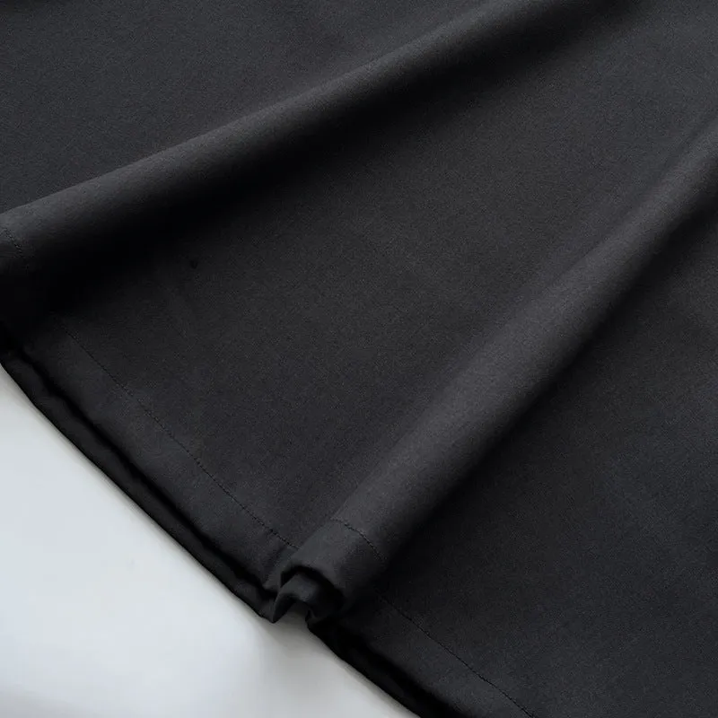Pleated puffy black A-line skirt