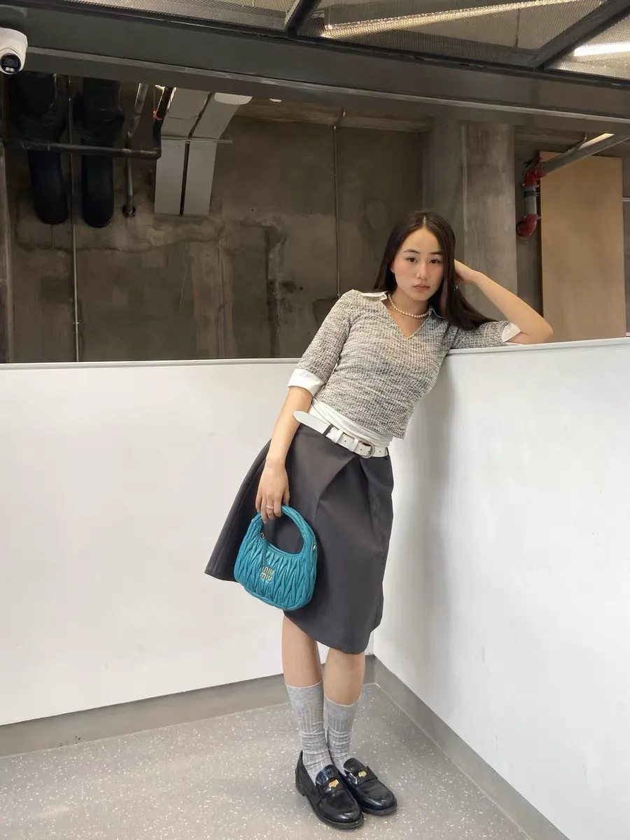 Pleated puffy black A-line skirt