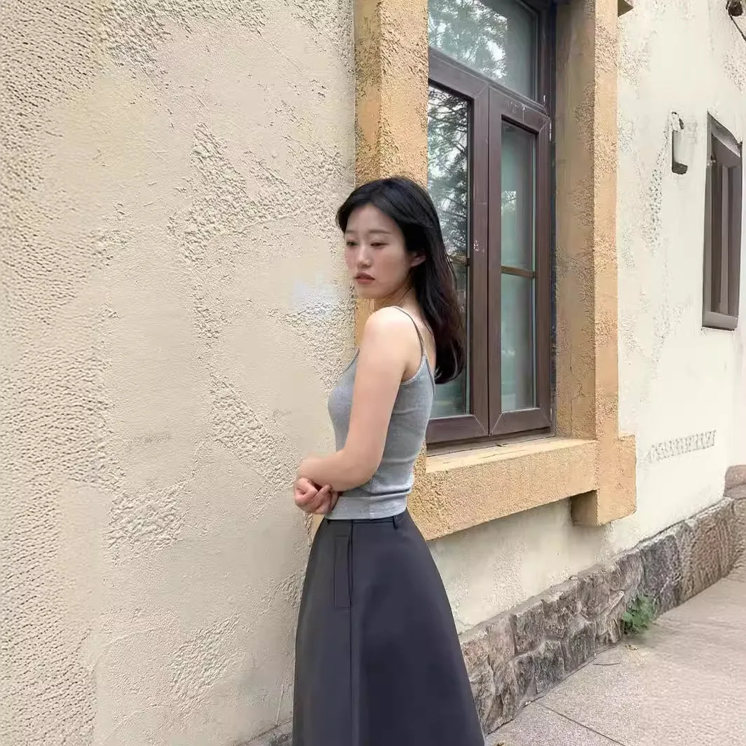Pleated puffy black A-line skirt