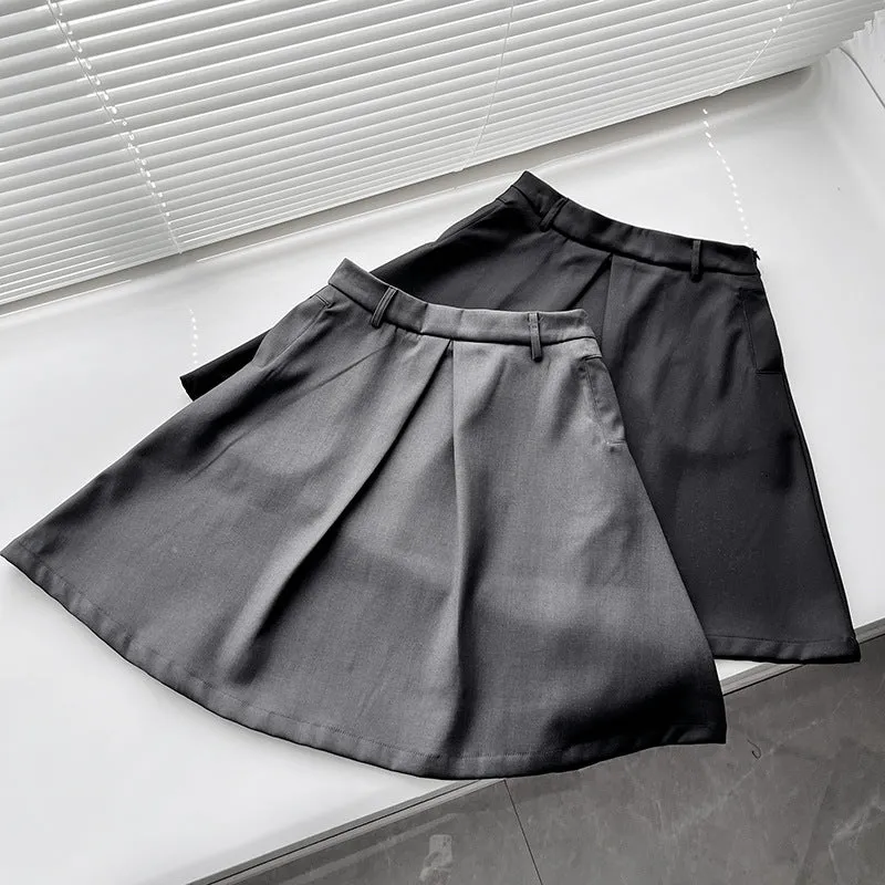 Pleated puffy black A-line skirt