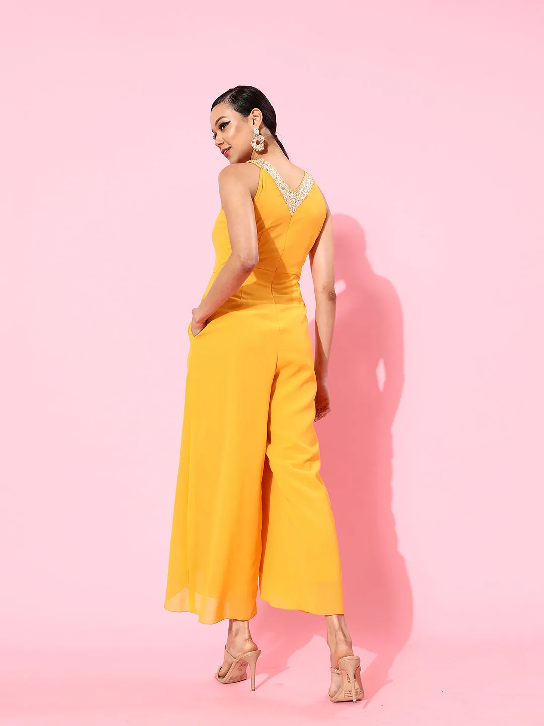 Women's Mustard Halter Neck Sleeveless Solid Embellished Regular Jumpsuit